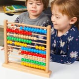 Kids-Wooden-Abacus---Boy-and-Girl-Playing-with-abacus-80527