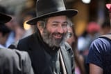 jewish-man-with-hat-smiling-at-mahane-yehuda-jerusalem-israel