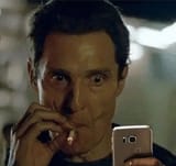 smoking-a-cigarette-while-staring-at-phone