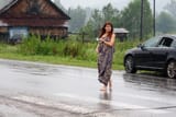 Nude-girl-buys-the-honey-in-the-rain-1