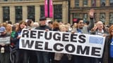 white women refugees welcome