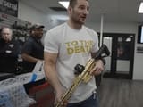 0117sean-strickland-gold-gun-e1705430950976