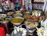 Soups-and-stews-on-sale-at-Phnom-Penh-Old-Market