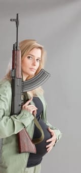 pregnant_woman_rifle_2181web-xx-483x1024