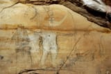 Picture Cave. possibly depicting Red Horn w decapitated head and long nosed god earpiece 