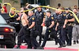 Gunman at the No King Protest