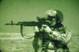 a-member-of-the-polish-army-special-forces-at-the-high-ready-position-in-ad-7f347c-1024