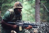 US_soldier_of_the_1st_Cavalry_Division_with_M16A1_&amp;_M203_Exercise_GRANADERO_I_1984_Honduras
