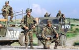 NATO forces in Kosovo In Gnjilane, Yugoslavia On June 14, 1999 - Soldier of the US 82nd Airborne on the road to Gnjilane