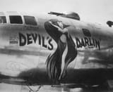 b_29_bomber_devil_s_darlin_nose_art_tinian