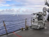 USS_Benfold_(DDG_65)_fires_its_Mark_38_25mm_gun_as_part_of_a_live-fire_gunnery_exercise_during_Pacific_Griffin_2021._(51283782505)