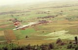 f-14-tomcat-from-vf-1-wolfpack-flies-a-combat-air-patrol-over-vietnam-in-april-1975-during-the-evacuation-of-saigon