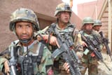 Afghan_National_Army_commandos_with_the_1st_Tolai,_3rd_Special_Operations_Kandak_conduct_a_simulated_village_patrol_during_a_training_exercise_in_the_Dand_district,_Kandahar_province,_Afghanistan,_May_25,_2013_130525-A-QS703-144