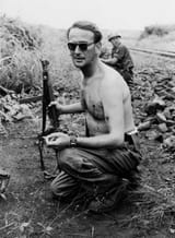 Swedish Major Eric Bonde smokes a cigarette after being ambushed and shot twice, Congo, 1961