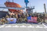 Cypriot (Greek) and US Navy SEALs in a photo onboard a ship