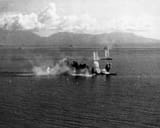 Japanese_battleship_Musashi_and_a_destroyer_under_attack_in_the_Sibuyan_Sea_24_October_1944_NH_63432