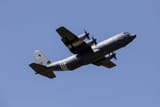 c-130-hercules-with-invasion-stripes-v0-ycks38f3s2ed1
