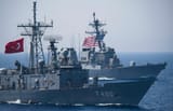 The_Turkish_G-Class_frigate_TCG_Gaziantep_is_underway_in_formation_USS_Donald_Cook_DDG_75._27325766933