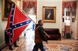 first man to ever take a confederate flag into the us capitol
