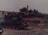 ARVN_M-48_tanks_are_positioned_near_the_Dong_Ha_River_overlooking_QL-9,_April_1972