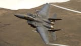 mcdonnell-douglas-f-15-eagle-flying-on-a-side-52549-2560x1440