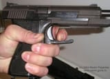 norinco-77b-9mm-pistol-it-has-a-unique-ability-to-rack-its-v0-i20c4ja9vuse1