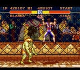 1170871-street-fighter-ii-snes-second-boss-vega-climbs-in-the-fence