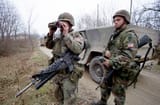US Soldiers on patrol with humvee Bosnia