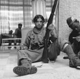 Cuban_revolutionary_with_M1903_rifle_and_Texas_Oil_Company_can