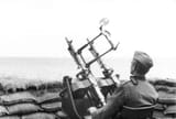 Bundesarchiv_Bild_101I-028-1632-13_Frankreich_Kustenschutz_mit_Flak-MG-Attribute