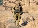 1200px-Australian_Army_soldier_armed_with_a_FN_MAG_machine_gun_in_Afghanistan_during_2010_-_cropped