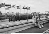 Major_General_R._A._Hay,_takes_the_salute_from_an_Australian_guard_at_the_Free_World_Military_Assistance_Forces_Headquarters