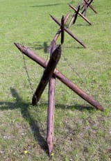 barbed-wire-fence-carrying-hedgehog-which-wound-to-delay-onset-enemy-infantry-war-80288557