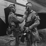 Paratrooper_applies_war_paint_111-SC-193551cropped