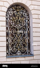 decorative-forged-metal-window-bars-in-the-old-building-2D10116