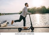 young-hipster-man-suit-riding-260nw-1715027326