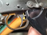 trigger over travel stop