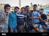 goa-india-27-january-2015-six-indian-men-stand-together-in-street-H031RY