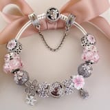 c1909b56eebd8520f253a2efc00dd234--pandora-charm-bracelet-ideas-pandora-pink-bracelet