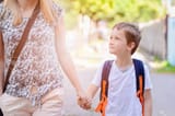 61929039-little-7-years-old-boy-going-to-school-with-his-mother