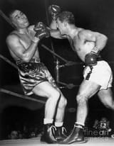rocky-marciano-knocking-out-joe-louis-bettmann