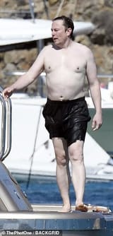 60412275-11025553-Beach_ready_The_billionaire_donned_black_swim_shorts_for_the_aft-a-1_1658178668604-2520199898