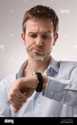 man-looking-at-watch-B3006W