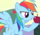 Dash looks puzzled at an apple