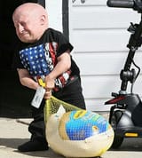verne troyer struggling with a turkey