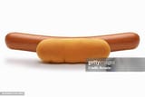 oversized-frankfurter-on-bun-close-up-studio-shot
