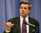37801602-9129391-Bremer_is_blamed_for_helping_fuel_the_Iraq_insurgency_by_disband-a-7_1610214144030