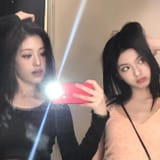 Photo shared by BABYMONSTER AHYEON (아현) FANPAGE on May 18, 2025 tagging @chiquita__babymonsters, and @ahyeon_babymonster. May be a selfie of 2 people, hair, mirror and text.