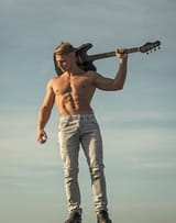 music-performance-entertainment-athlete-guitarist-six-pack-ab-jeans-outdoor-man-muscular-torso-hold-electric-guitar-123258337