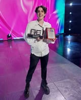 1200px-Luke_Black_with_OGAE_Serbia_Awards_2023[1]